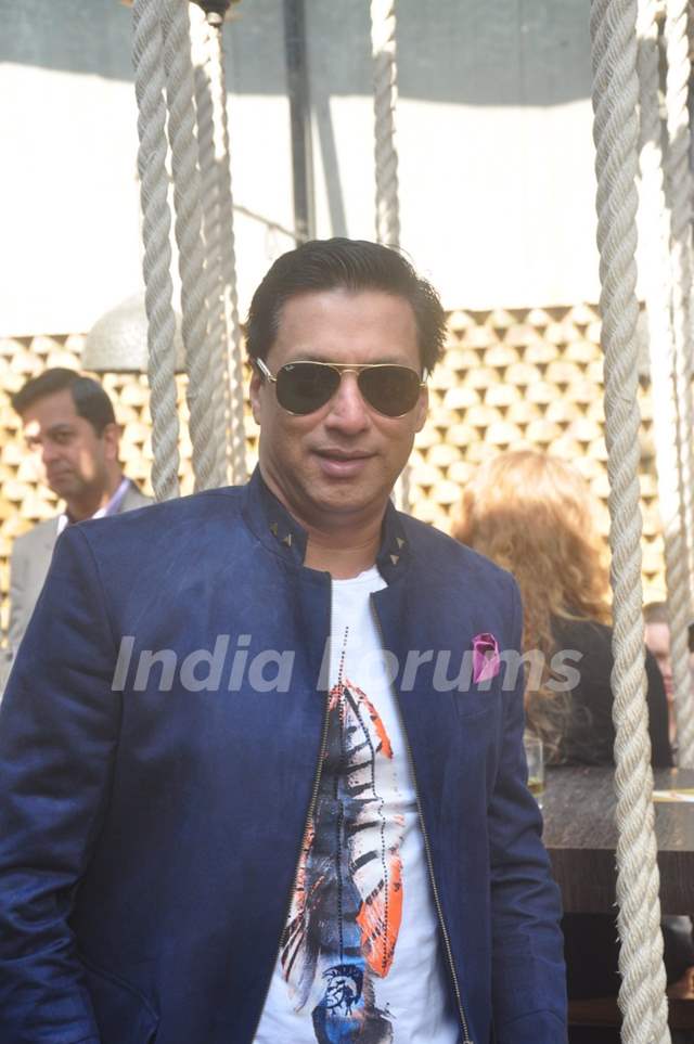 Madhur Bhandarkar poses for the media at Joe Rajan's Christmas Bash