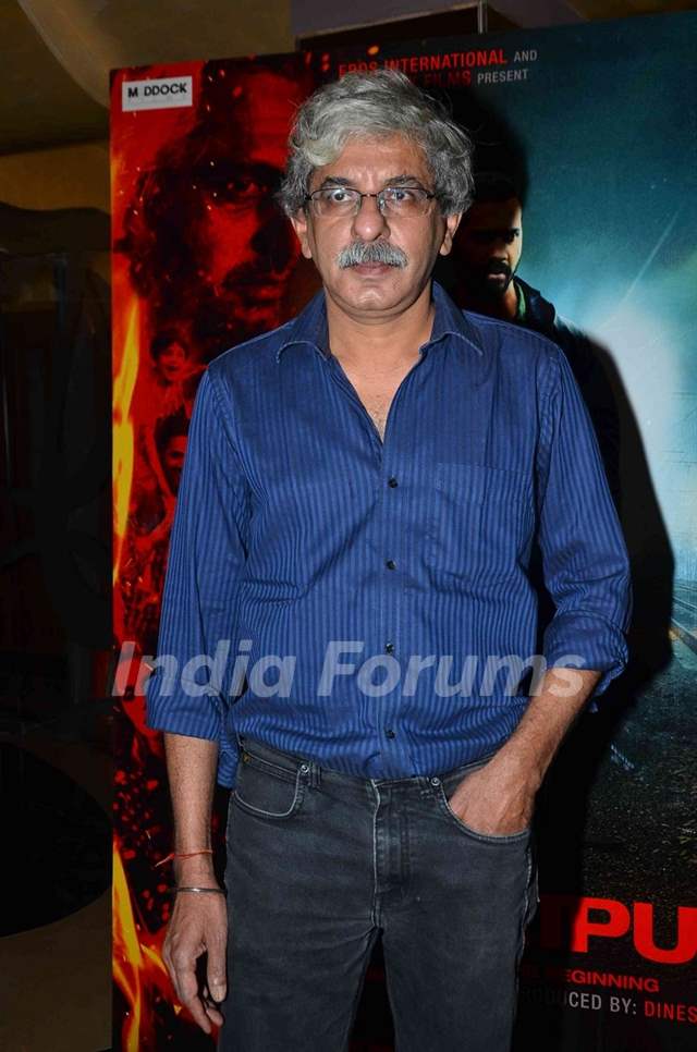 Sriram Raghavan poses for the media at the Song Launch of Badlapur