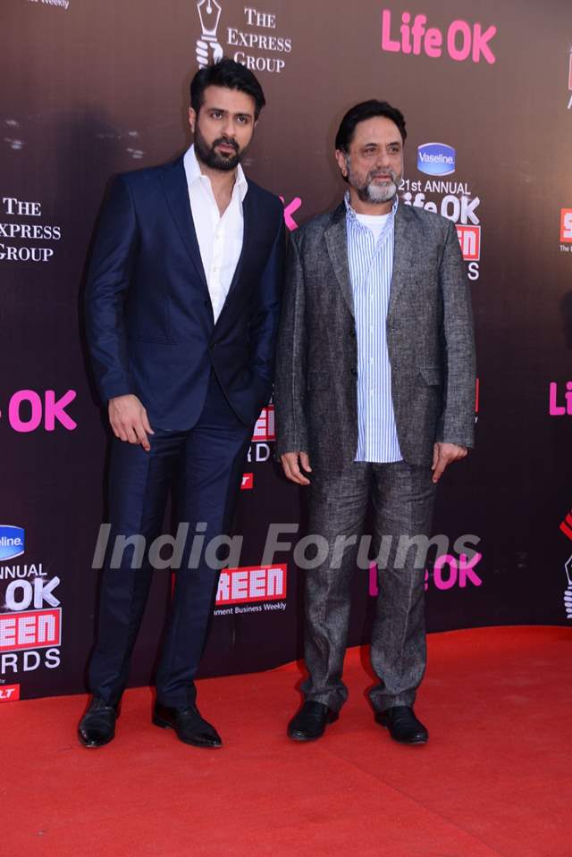 Harman Baweja and Harry Baweja pose for the media at 21st Annual Life OK Screen Awards Red Carpet