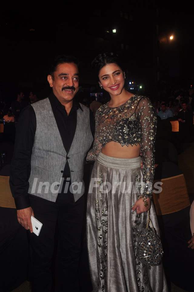 Kamal Haasan poses with daughter Shruti Haasan at the Music Launch of Shamitabh