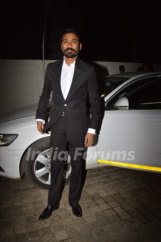 Dhanush poses for the media at the Special Screening of Shamitabh