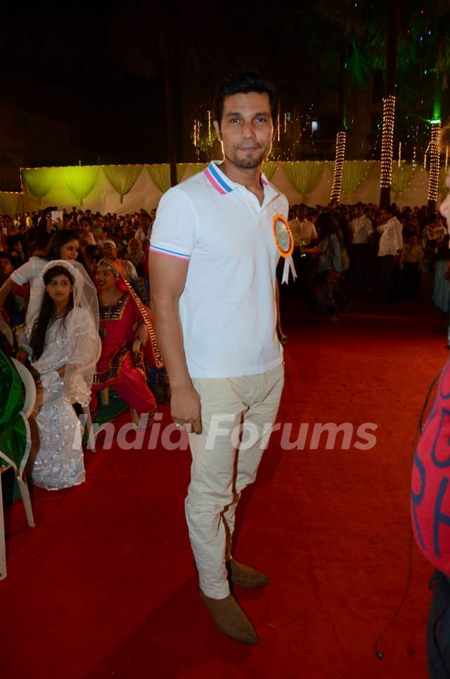 Randeep Hooda poses for the media at the Annual Day of Children's Welfare Centre High School