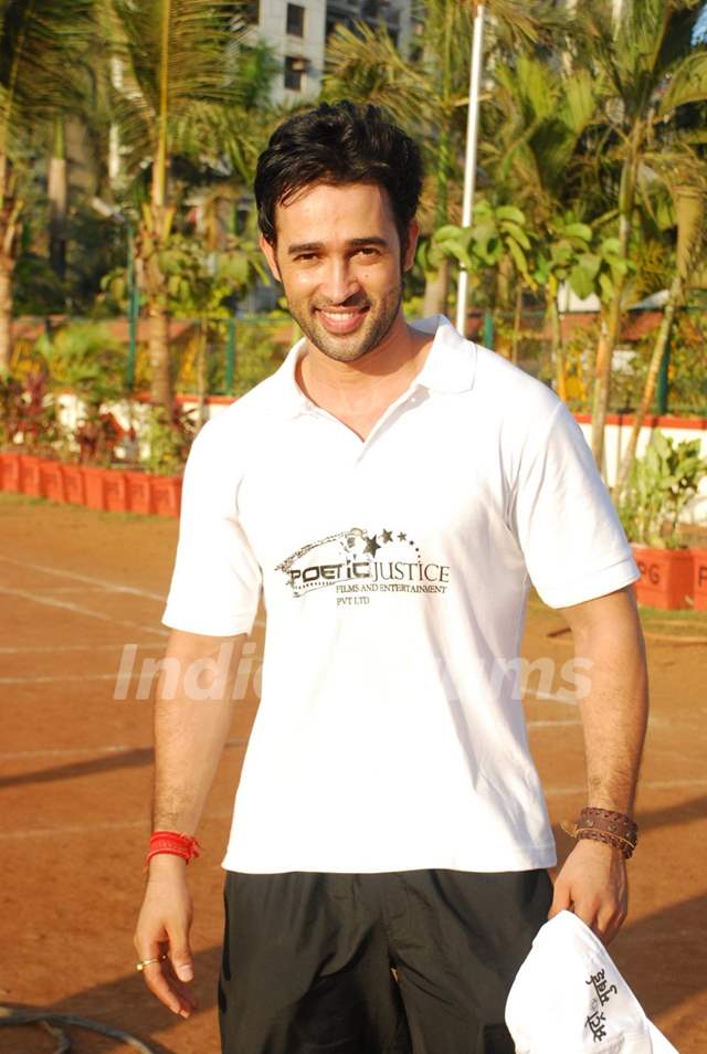 Karan Sharma poses for the media at Cricket for Peace Media