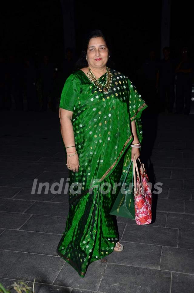 Anuradha Paudwal poses for the media at Tulsi Kumar's Wedding Reception
