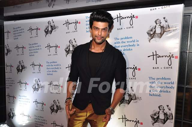 Kushal Tandon poses for the media at the Launch of Harry's Bar & Cafe
