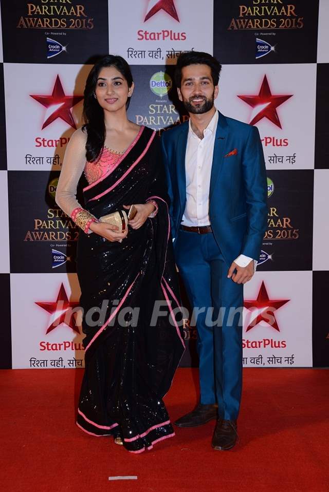 Disha Parmar and Nakuul Mehta pose for the media at Star Parivaar