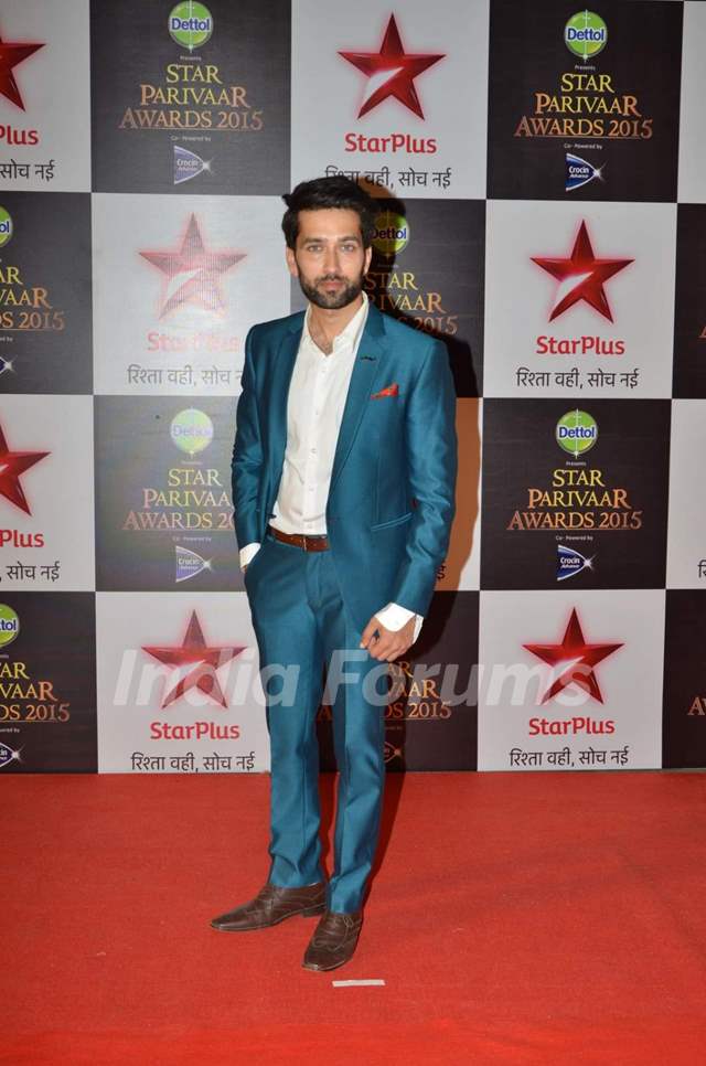 Nakuul Mehta poses for the media at Star Parivaar Awards 2015