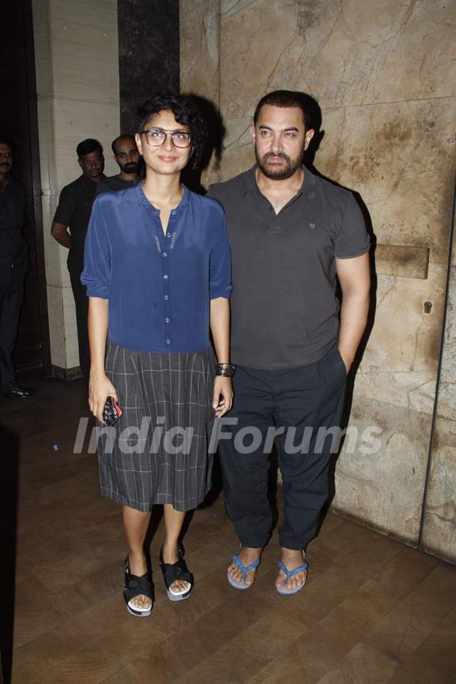 Aamir Khan and Kiran Rao pose for the media at the Special Screening of Dil Dhadakne Do