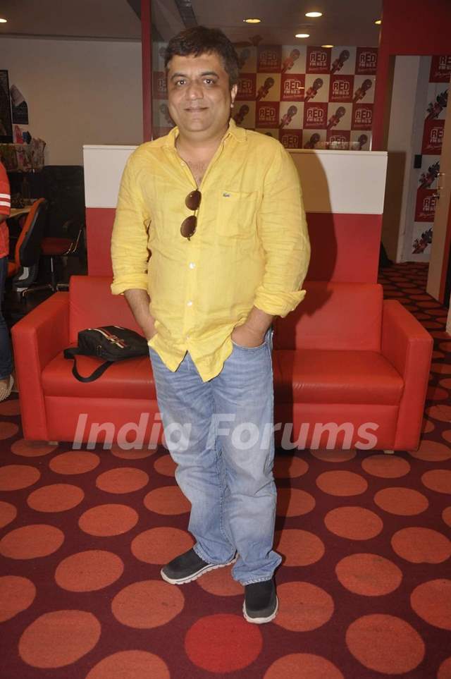 Swanand Kirkire poses for the media at the Promotions of Masaan on Red FM