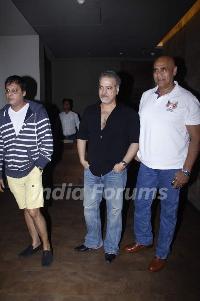 Naved Jaffery and Puneet Issar pose for the media at the Screening of Bahubali