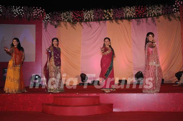 Behenein performing on the stage for Purva''s sangeet