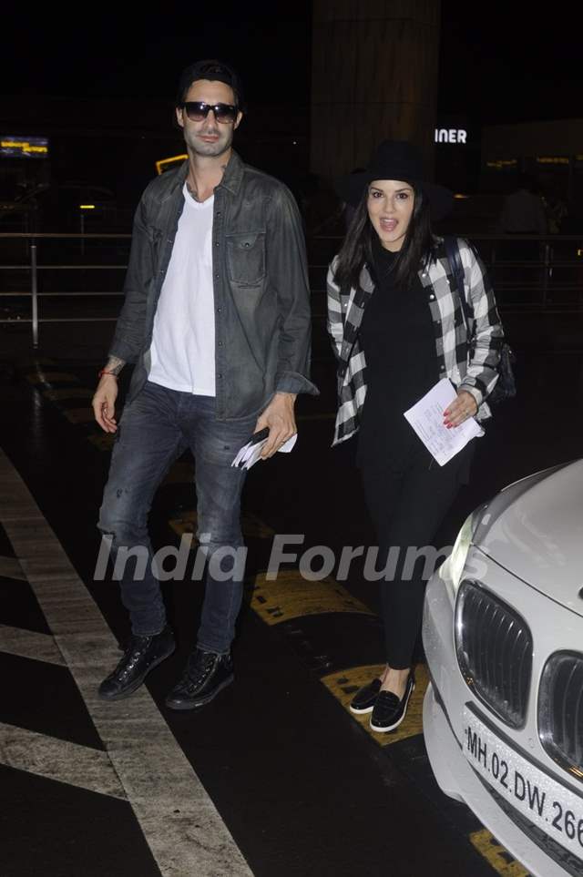 Sunny Leone Snapped With Her Husband Daniel Weber At Airport Photo