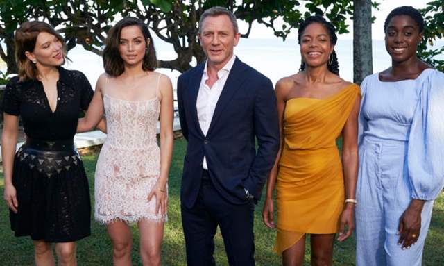 Lea Seydoux, Ana de Armas, Daniel Craig, Naomie Harris and Lashana Lynch pose for a picture for Bond 25