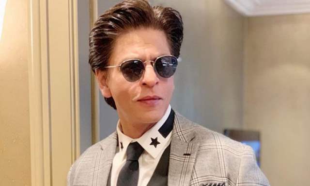 Shah Rukh Khan channels his inner Jawan in style with blue jacket