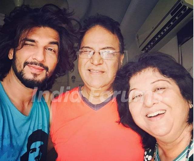 Manish Raisinghan with his parents