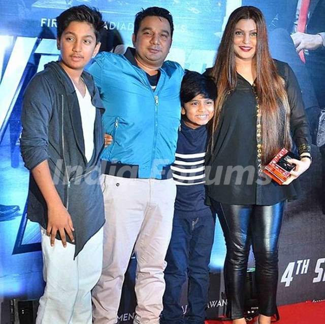 Ahmed Khan with his wife and sons
