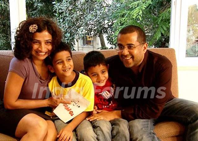 Chetan Bhagat with his wife Anusha and sons Ishaan (left), Shyam (right)