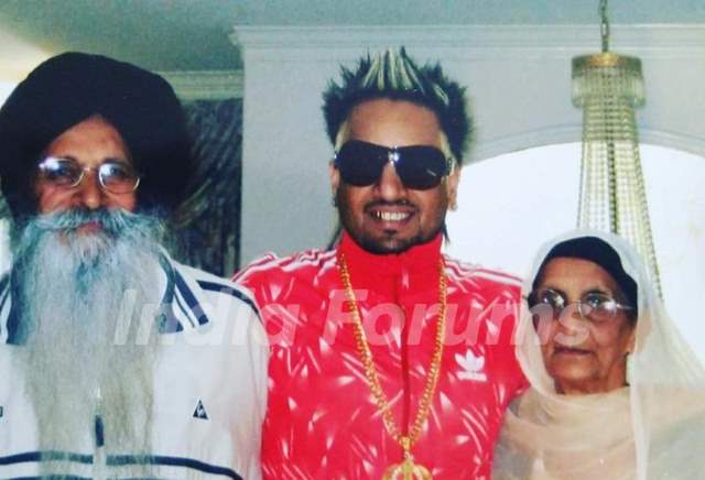 Jazzy B with his parents