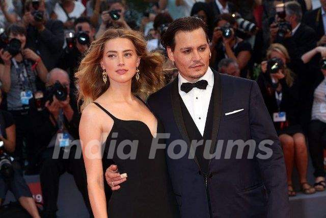 Johnny Depp with his girlfriend Amber Heard