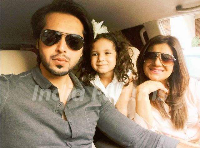 Fahad Mustafa with his wife and daughter