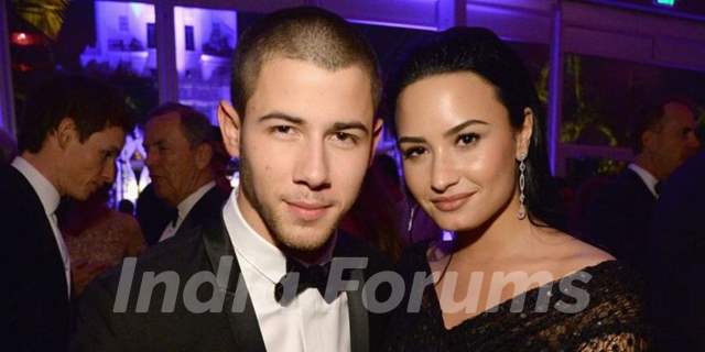 Nick Jonas with Demi Lovato