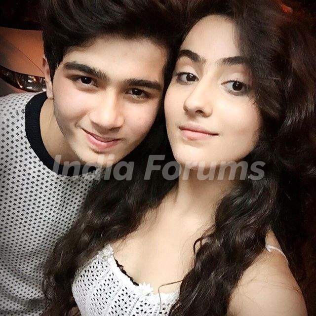 Diana Khan with her brother
