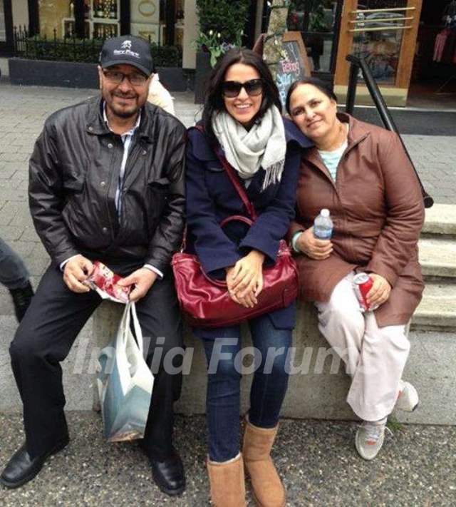 Neha Dhupia with her parents