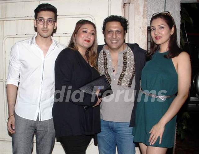 Govinda with his wife and children