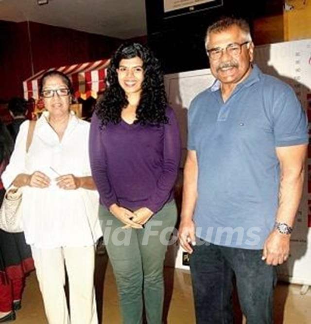 Sharad Saxena with his wife and daughter