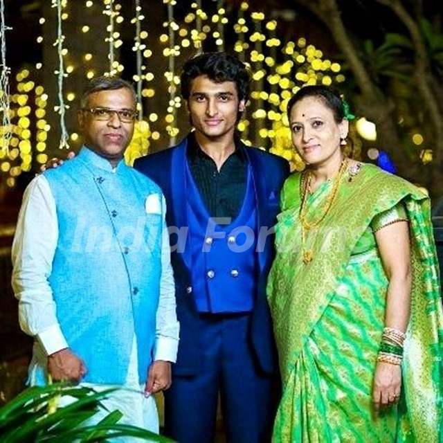 Rushiraj Pawar with his parents