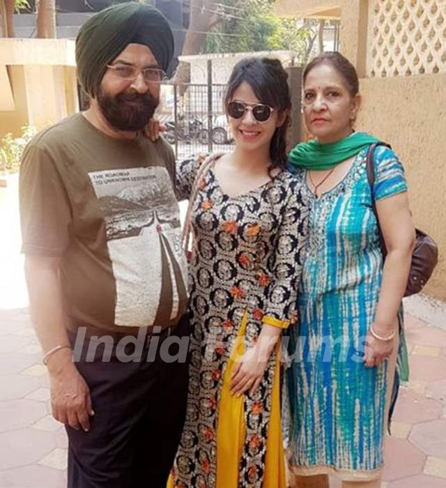 Neha Pawar with her parents