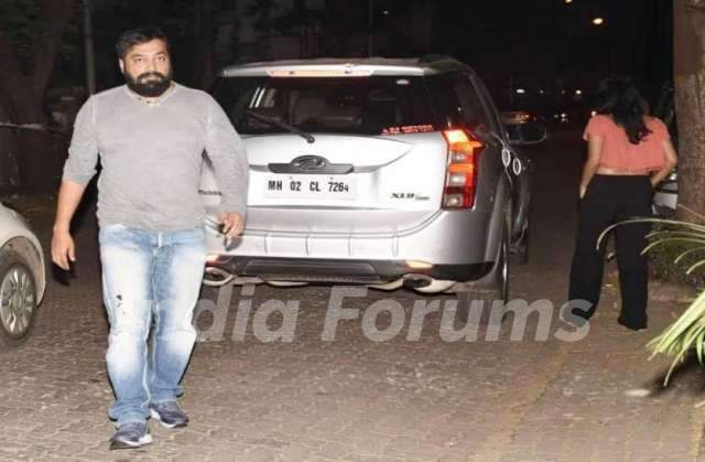 Anurag Kashyap with his car behind