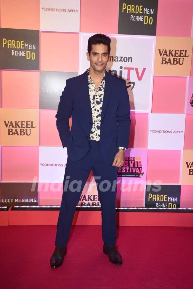 Angad Bedi made a fashion statement in a midnight blue blazer and trousers paired with a printed shirt