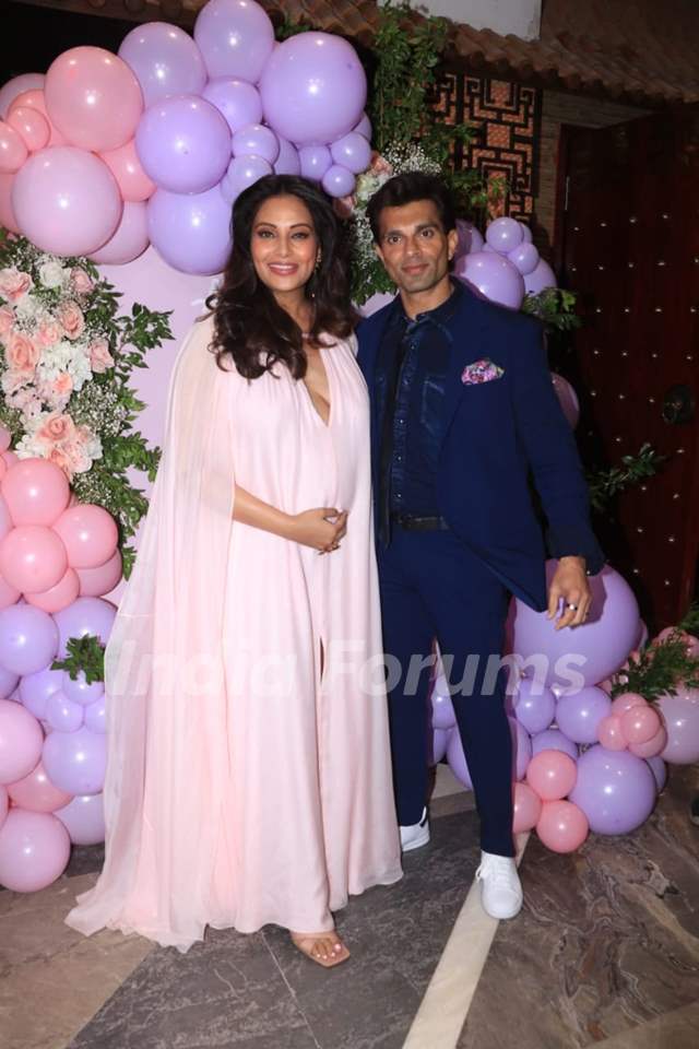 Bipasha Basu and Karan Singh Grover papped at Bipasha’s baby shower. Bipasha looked lovely in a baby pink gown and Karan looked dapper in a blue pant suit set