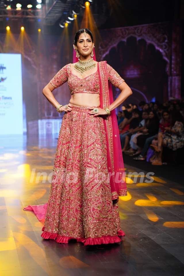 Ahana Kumra looked breathtaking in a red lehenga at the Bombay Times Fashion Week