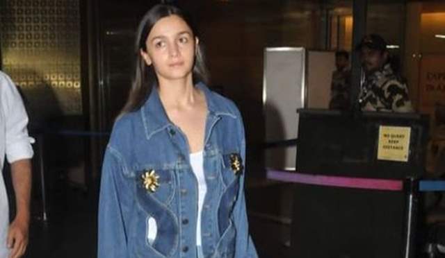 She looks like a kid': Alia Bhatt aces denim-on-denim look as she returns  from Brazil but netizens aren't convinced