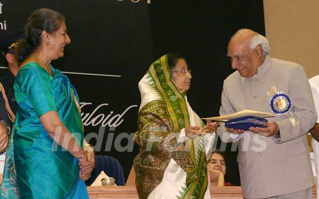 President Pratibha Devi Singh Patil presenting '''' 55th National film award to Yash Chopra on behalf of her son Aditya Chopra at Vigyan Bhawan, in New Delhi on Wednesday, also in photo I and B minister Ambika Soni