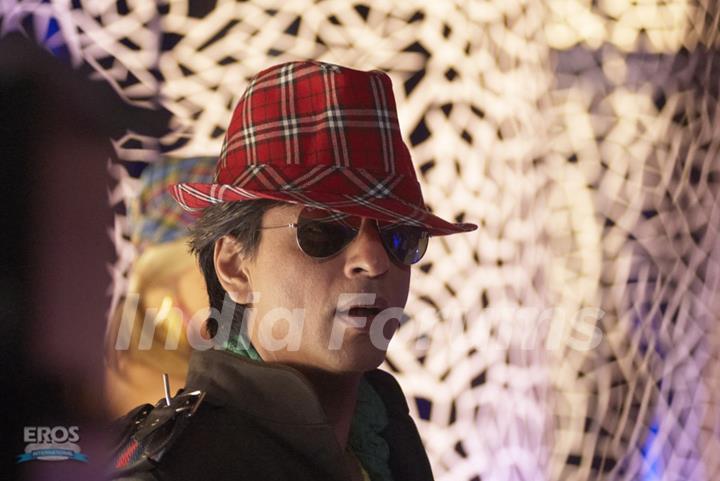 Shahrukh looking wonderful in red hat