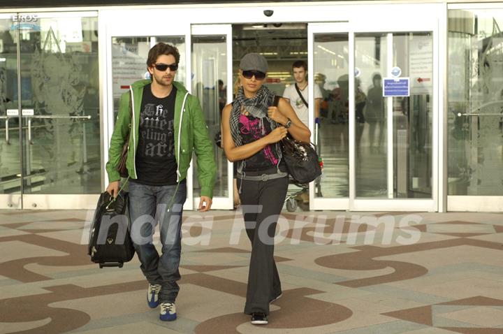 Neil and Bipasha coming out from the airport