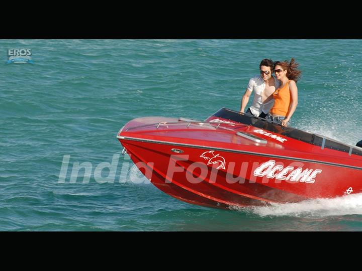 Shiney and Kaveri standing on a motor boat