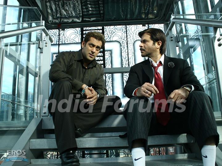 Anil Kapoor and Salman Khan sitting on the staircase