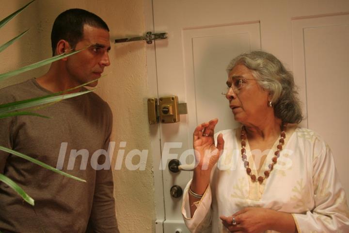 Akshay talking to a old lady