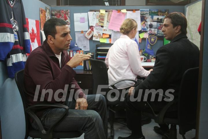 Akshay looking abnormal and Javed looking at him