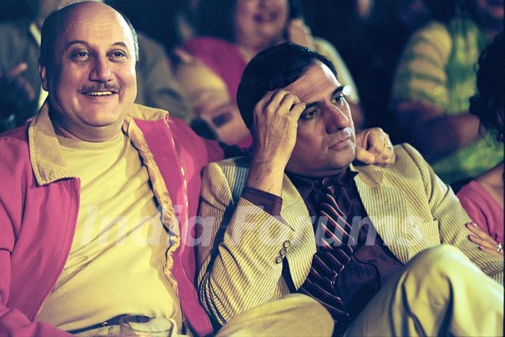 Anupam looking happy and Boman looking confused