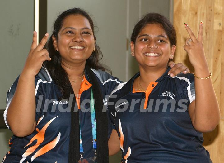 Sayyed Anisa and Sarnobat Rani after winning the Gold in Shooting, Pairs 25 M Pistol Women event at the 19 Commonwealth Games 2010 in New Delhi