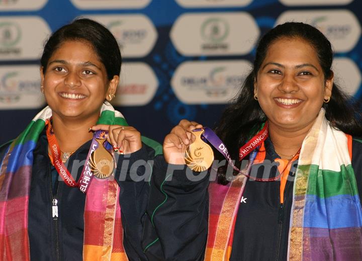 Sayyed Anisa and Sarnobat Rani after winning the Gold in Shooting, Pairs 25 M Pistol Women event at the 19 Commonwealth Games 2010 in New Delhi