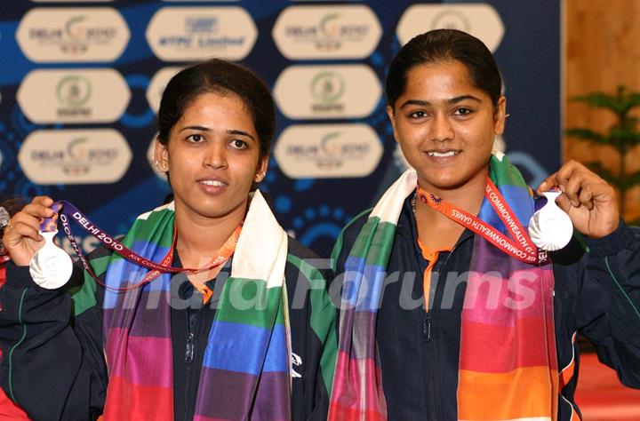 Tejaswini Sawant and Lajjakumari after winning the Siver in Shooting, Pairs 50 M Rifle 3 Positions Women event at the 19 Commonwealth Games 2010 in New Delhi