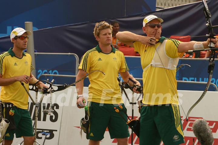 Matthew Gray, Mat Masonwells and Taylor Worth of Australia  in the Men's Team Recurve event at the 19th Commonwealth Games on Friday