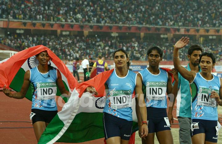 The gold medal winning Indian 4 x 400 relay team celebrates after the women's 4 x 400 relay final at the 19th Commonwealth Games in New Delhi on Tuesday 12 Oct 2010