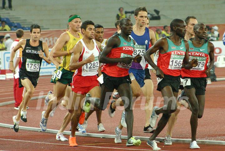 Silas Kiplagat (R) of Kenya during the Men's 1500 Metres Final at the 19th Commonwealth Games in New Delhi on Tue 12 Oct 2010